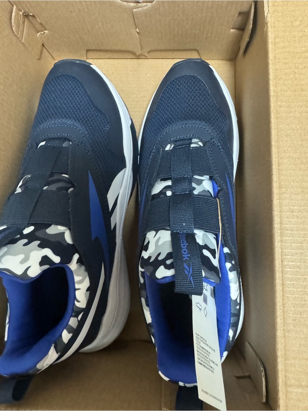 Reebok Kids Navy Blue Camouflage Slip-On Sneakers with Blue Accents. Sprinter xt